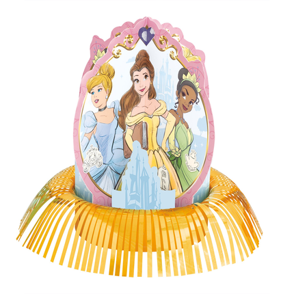 A Disney Princess pop-up party hat featuring Cinderella, Belle, and Tiana in their classic gowns, set in an oval frame with a pink border and gold accents, supported by a yellow fringed base.