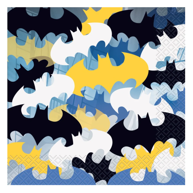 Patterned paper napkins with bat shapes in black, white, blue, and yellow on a blue background.