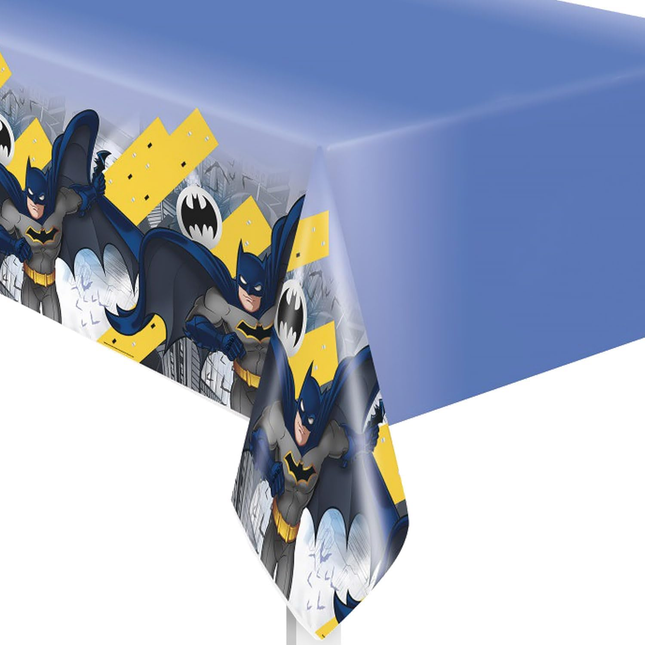 Batman-themed table cover with character illustrations on a blue background
