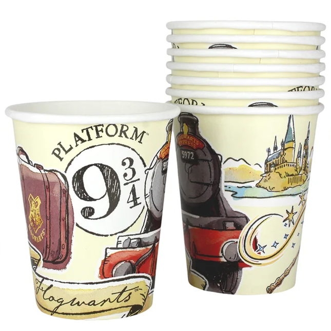 Paper cups with Harry Potter-themed designs featuring a castle and platform 9 3/4.