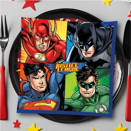 Napkin with Justice League characters on a black plate with red and yellow stars.