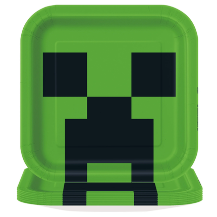 Green paper plates with black square design resembling a creeper from Minecraft on a white background