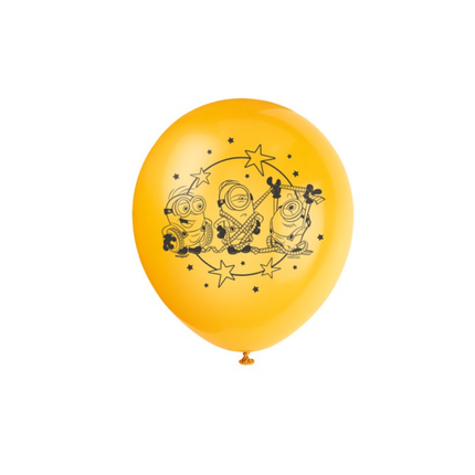 A yellow latex balloon featuring a black graphic print of three Minions characters with stars and a crescent moon, shown against a plain white background.