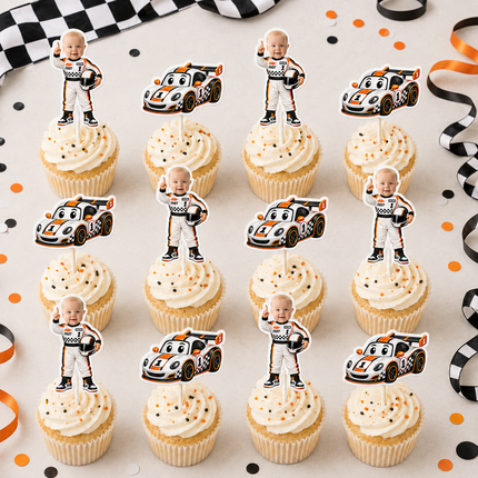 Twelve personalized cupcake toppers arranged on top of iced cupcakes. The set includes cartoon race cars and baby cutout figures wearing racing suits, all on a decorated party background with confetti and streamers.