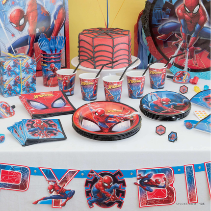 Spider-Man themed party supplies including plates, cups, and decorations on a table.